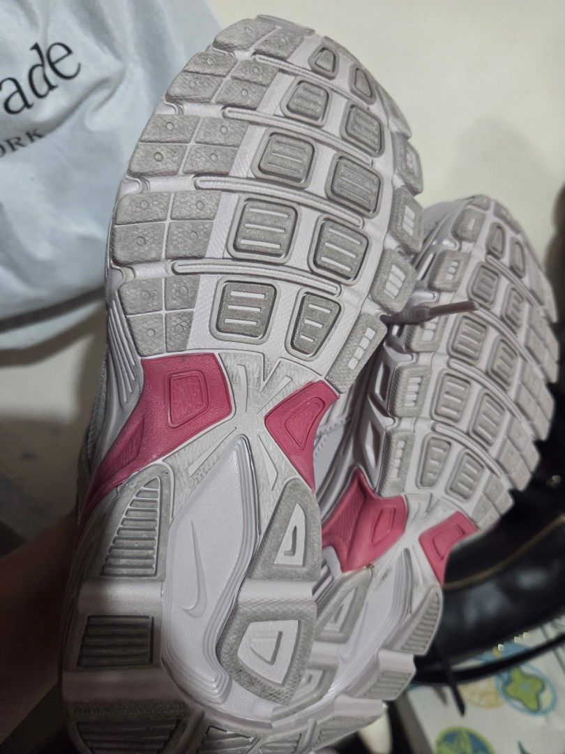 Nike Sneakers Pink Size US 6.5 (Category: Sneakers) located in Manila. Submitted by analiepagl91301 (Listing ID 1470675345, Image 3). Description: - Brand: Nike - Color: Light Pink - Size: US Women's 6.5 - Style Code: 394053-009 - Material: Breathable mesh upper with a comfortable padded collar - Insole: Pink cushioned insole with classic white Nike swoosh logo - Condition: Clean interior, well-maintained, and ready to wear.