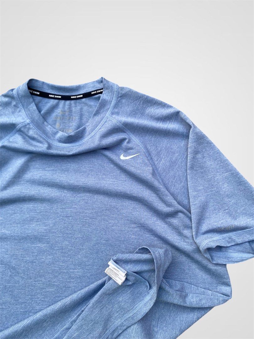 Nike Swim (Category: Formal Shirts) located in Bauang. Submitted by thriftydetrese (Listing ID 1470666641, Image 3). Description: Nike Hydroguard Dri-Fit UPF 40+ Heather Blue Size Medium/Large W- 22 L- 27 No issue Brand new Excellent Condition .