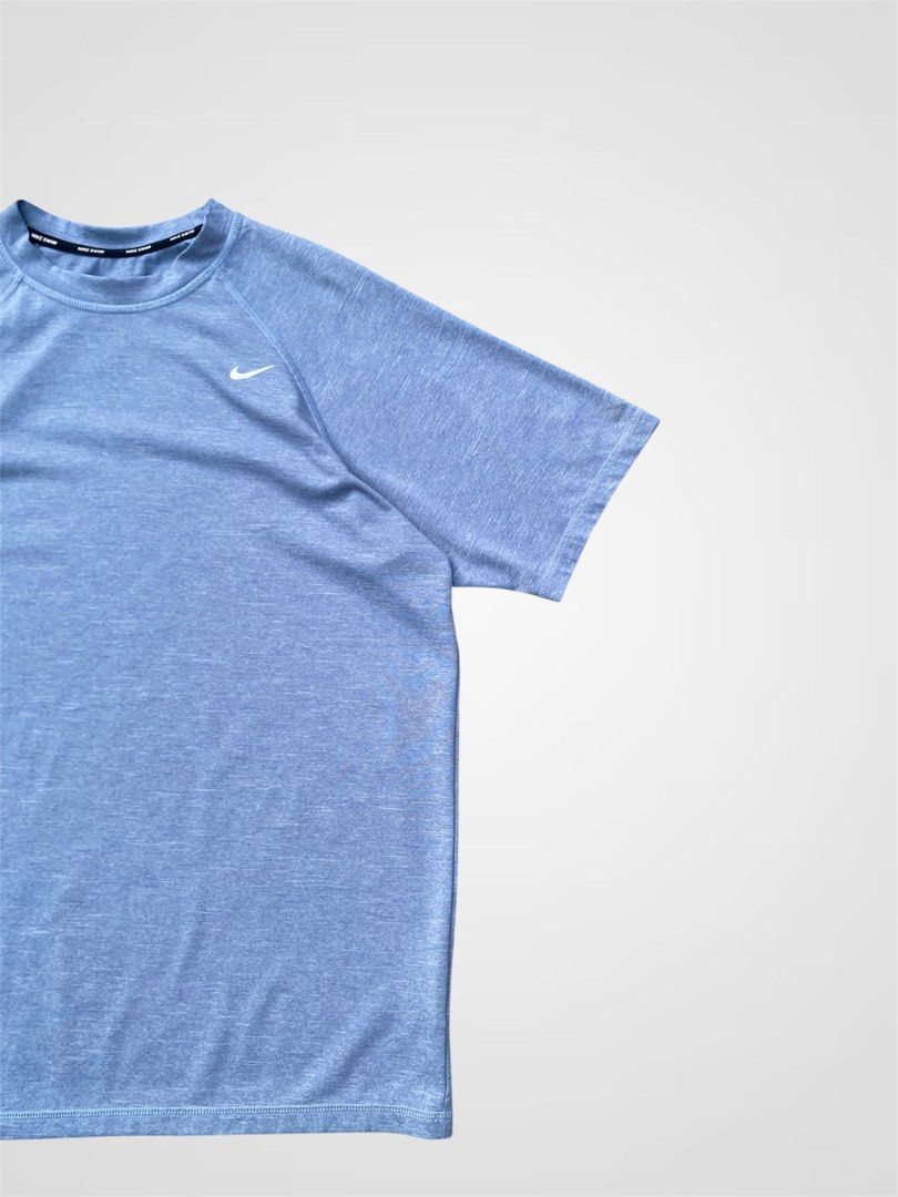 Nike Swim (Category: Formal Shirts) located in Bauang. Submitted by thriftydetrese (Listing ID 1470666641, Image 2). Description: Nike Hydroguard Dri-Fit UPF 40+ Heather Blue Size Medium/Large W- 22 L- 27 No issue Brand new Excellent Condition .