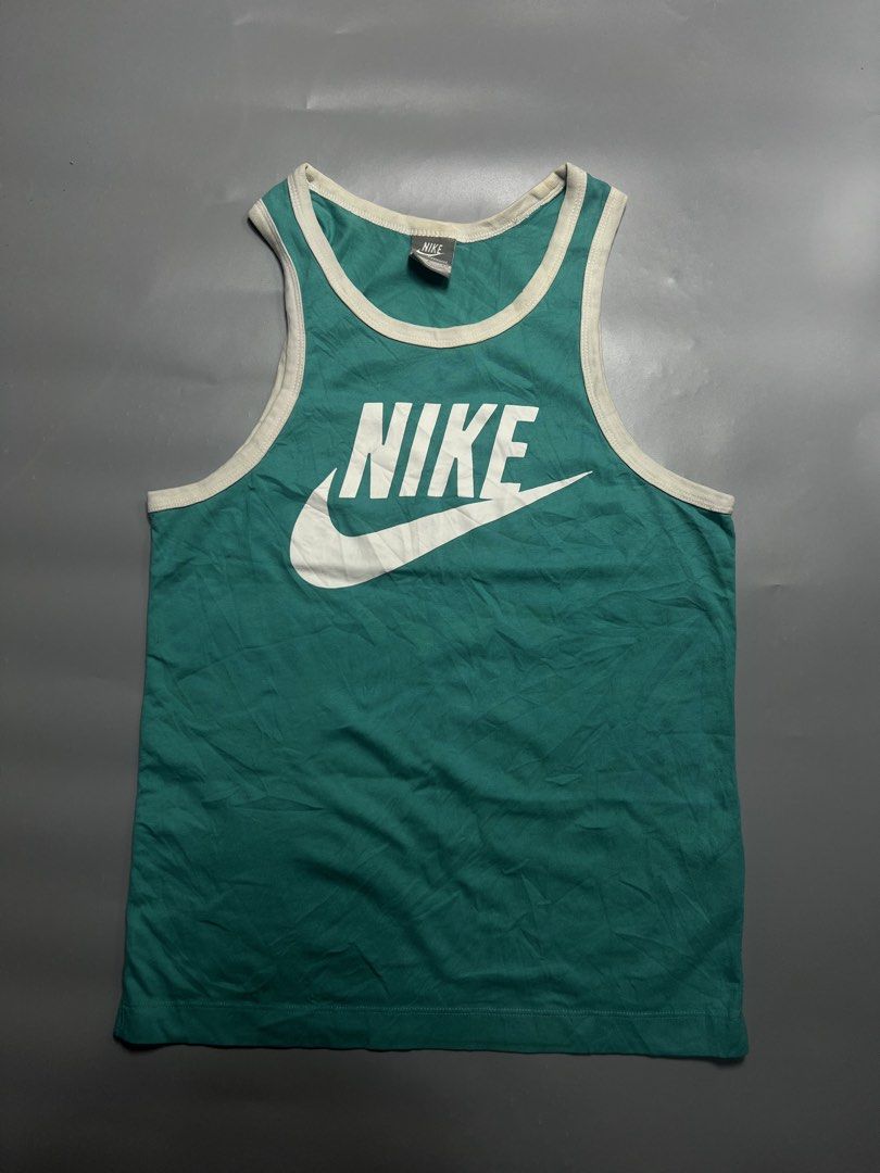 Nike tank top Size Small (Category: Activewear) located in Ragay. Submitted by sergesalgado (Listing ID 1470673440, Image 1). Description: Nike tank top Width:17 Length:25 Issue:yellowing white parts but removable.