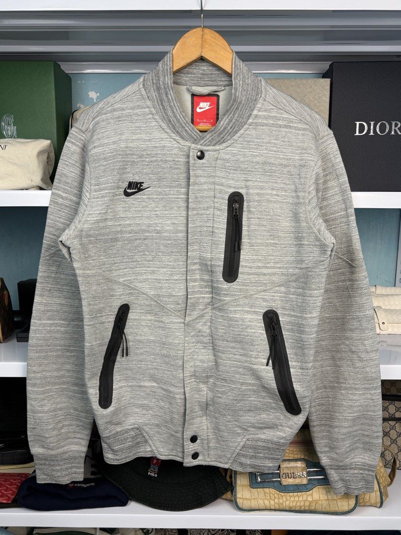 NIKE TECHFLEECE (Category: Coats, Jackets and Outerwear) located in Quezon City. Submitted by generalmerchandiseph (Listing ID 1470735378, Image 2). Description: - NIKE TECHFLEECE VARSITY JACKET - HEATHER GREY COLORWAY - MULTI LAYER TECH MATERIAL - ZIP UP AND SNAP BUTTON - 20.5W X 27L DIMENSIONS - MEDIUM MENS BEST FIT - EXCELLENT USED CONDITION - HONGKONG / JAPAN SOURCE ✈️ - WASHED AND READY TO WEAR 🫧.