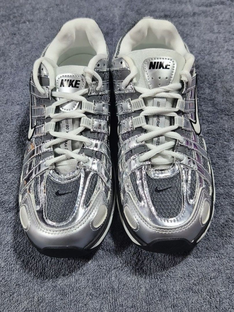 Nike V2K Run Metallic Silver (Category: Sneakers) located in Manila. Submitted by kikocastro37272 (Listing ID 1470694358, Image 1). Description: - Model: Nike V2K Run - Colorway: Metallic Silver and Grey - Features: Chunky sole design, breathable mesh upper panels, white laces, and black swoosh detailing - Condition: Fresh pair, clean outsoles with zero tread wear - Status: Ready to wear.