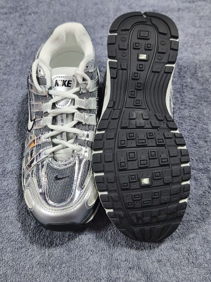 Nike V2K Run Metallic Silver (Category: Sneakers) located in Manila. Submitted by kikocastro37272 (Listing ID 1470694358, Image 3). Description: - Model: Nike V2K Run - Colorway: Metallic Silver and Grey - Features: Chunky sole design, breathable mesh upper panels, white laces, and black swoosh detailing - Condition: Fresh pair, clean outsoles with zero tread wear - Status: Ready to wear.
