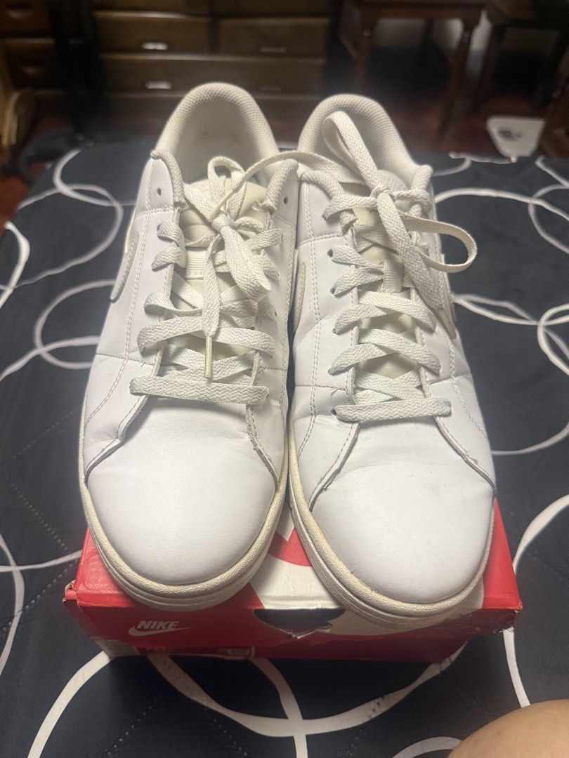 Nike White Casual Sneakers with Original Box (Category: Sneakers) located in Quezon City. Submitted by d8bhk9y4rs (Listing ID 1470651517, Image 1). Description: - Brand: Nike Court - Style: Classic everyday leather sneaker - Color: Clean white with matching laces - Included: Original red box - Condition: Good pre-loved condition with minor toe creases and light sole wear along the edges - Size: Message to inquire.