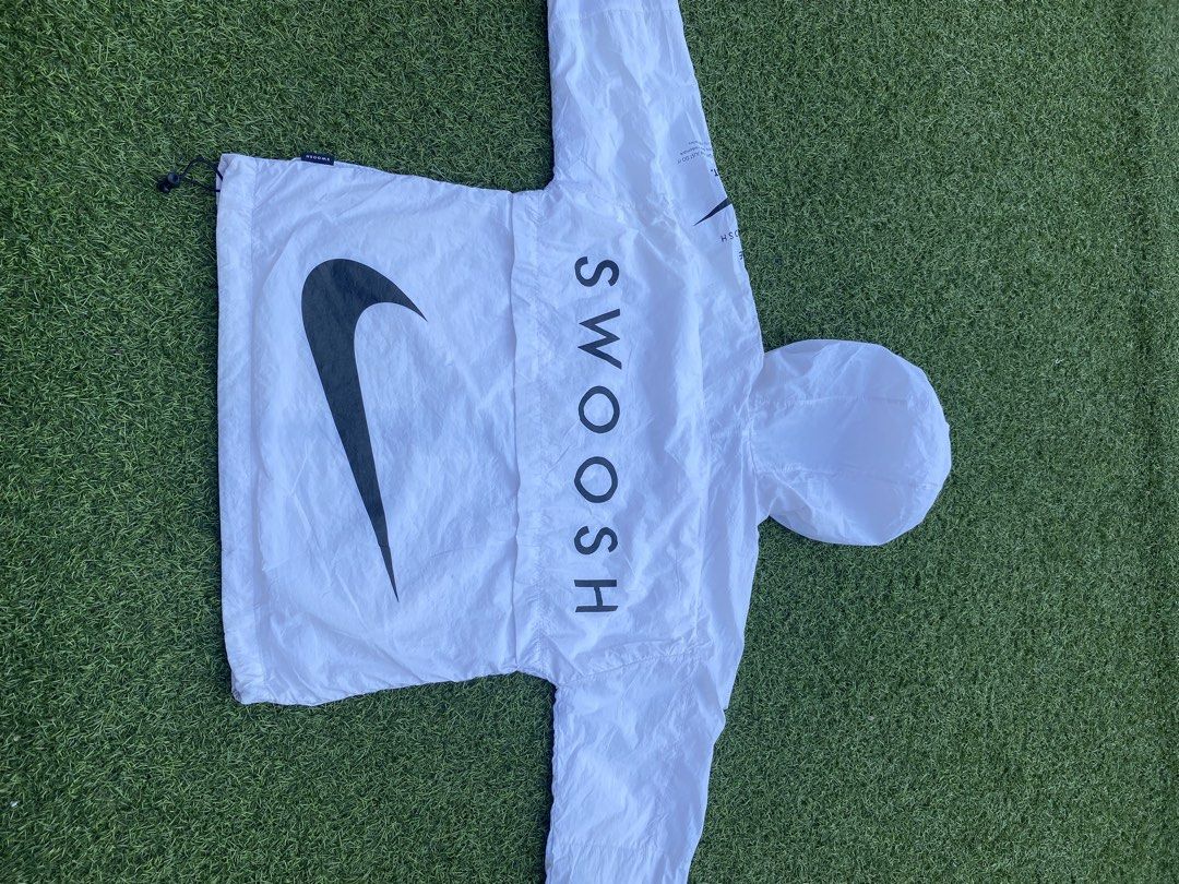 Nike windbreaker white just do it. (Category: Hoodies) located in Caloocan City. Submitted by walkthrift.manila.co (Listing ID 1470703122, Image 2). Description: Authentic Size :Small fits to medium. Dimes :21x25 No issue .