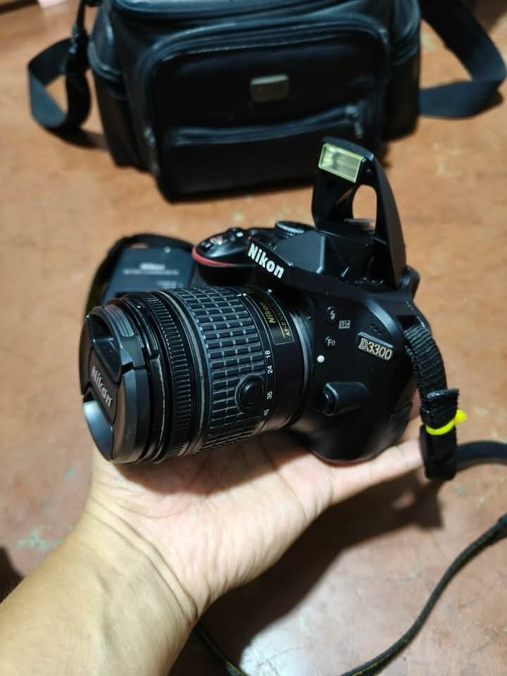 Nikon d3300 24megapixels with 18-55mm Kitlens (Category: Cameras) located in Manila. Submitted by camera.matrix.ph (Listing ID 1470688845, Image 1). Description: Nikon d3300 24megapixels with 18-55mm Kitlens for your Photojornalism Journey 14,500 Only Cash 14,500 Pesos 14,500k Php 14,500k Usdt Gcash Crypto Complete set with Camera Bag Memory Card Nikon Lens cap Nikon Chargger Nikon Battery Nikon Strap Nikon 18-55mm Lens Nikon d3300 24megapixels W