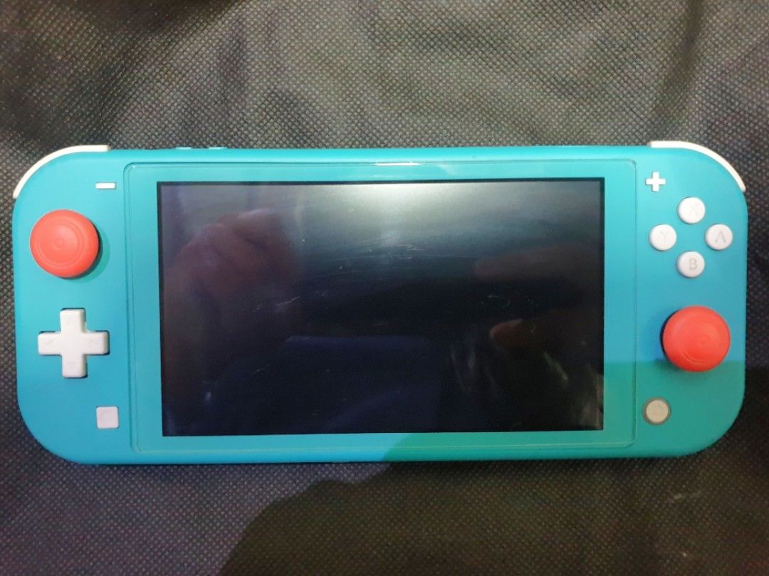 Nintendo Switch (Category: Nintendo) located in Manila. Submitted by coolforest-087a (Listing ID 1470638565, Image 1). Description: Note!! lightly used, no damage..