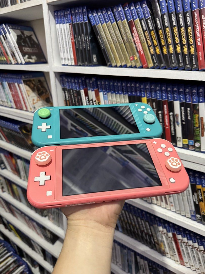 Nintendo Switch Lite (JB full of games) (Category: Nintendo) located in Manila. Submitted by 828gamingphmnl (Listing ID 1470619209, Image 2). Description: for sale!! nintendo switch lite jb 128gb 🎮 turquoise & coral pink available 8k each with free games of your choice with free pouch bag and thumb grips we accept walk ins!! cod nationwide 🚚.