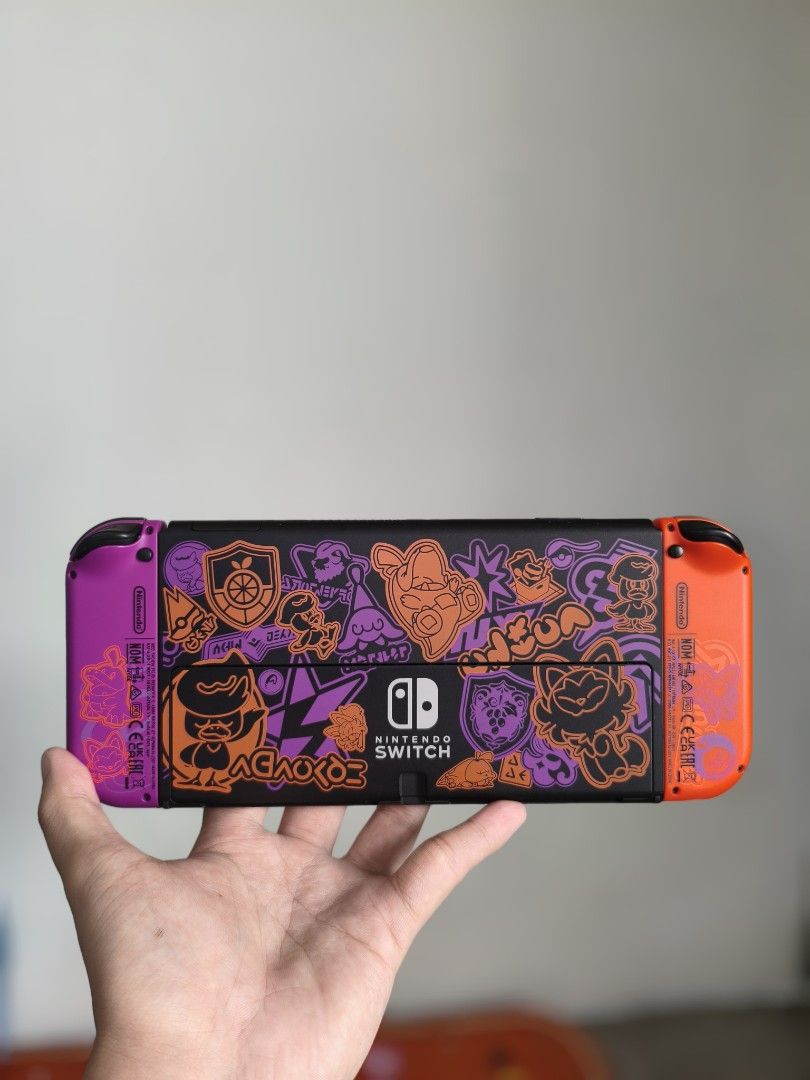 Nintendo Switch OLED Pokemon Scarlet & Violet Edition + Complete Accessories & Box (Category: Nintendo) located in Navotas City. Submitted by alexissedi68303 (Listing ID 1470592923, Image 3). Description: FOR SALE: Nintendo Switch OLED Pokemon Scarlet & Violet Edition + Complete Accessories & Box Condition: 9/10 P9,490.00 Only Inclusions: ✅OLED tablet ✅Original Joy-cons ✅Original Joy-con straps & Original Grip ✅Original Dock & Original HDMI ✅Orig
