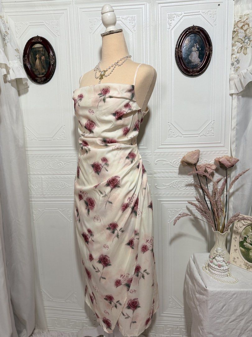 Off-white Red Rose Print Ruched Maxi Dress (Category: Dresses) located in San Jose. Submitted by vintagely_retro (Listing ID 1470639313, Image 3). Description: With lining | side zip | side slit Measurements: Frame Medium-Large Bust 34-38” Waist 30-32” Length 46-47”.