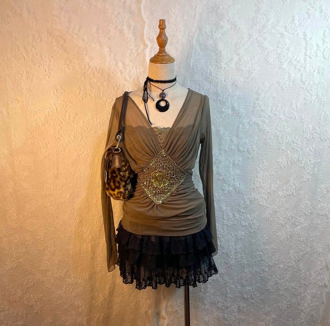 Olive Light Brown Rhinestone Longsleeve Top (Category: Longsleeves) located in Manila. Submitted by littlenicsfinds (Listing ID 1470674574, Image 2). Description: s-l, slight stretch.