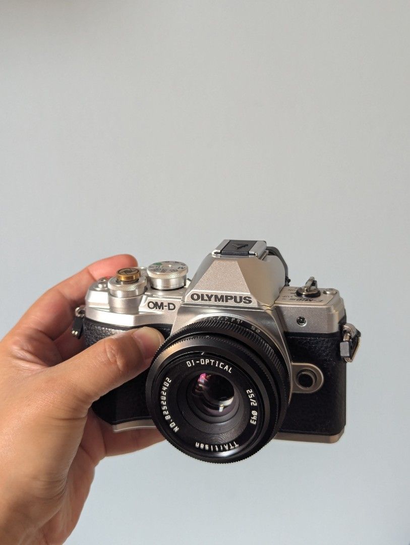 Olympus OM-D E-M10 Mark III with TTArtisan Lens (Category: Cameras) located in Bacolod City. Submitted by beanstalkfinds (Listing ID 1470605196, Image 1). Description: For Sale Olympus EM10 mriii with Ttartisan 25mm f2 (pass sa trade) - Mint condition | Minor sign of usage (barely noticeable) - Clean sensor | No dust/fungus - No loose rubber | No vignetting - No Box Inclusions: - Brand new Ttartisan 25mm f2, I bought a few days ago - 1 Original b