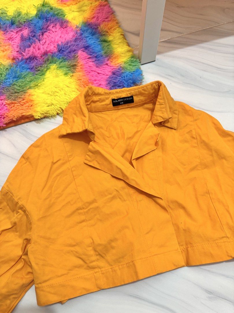 Orange Cropped Button Longsleeves Top (Category: Longsleeves) located in Bulacan. Submitted by archivesbyjanine (Listing ID 1470680402, Image 2). Description: Makapal tela.