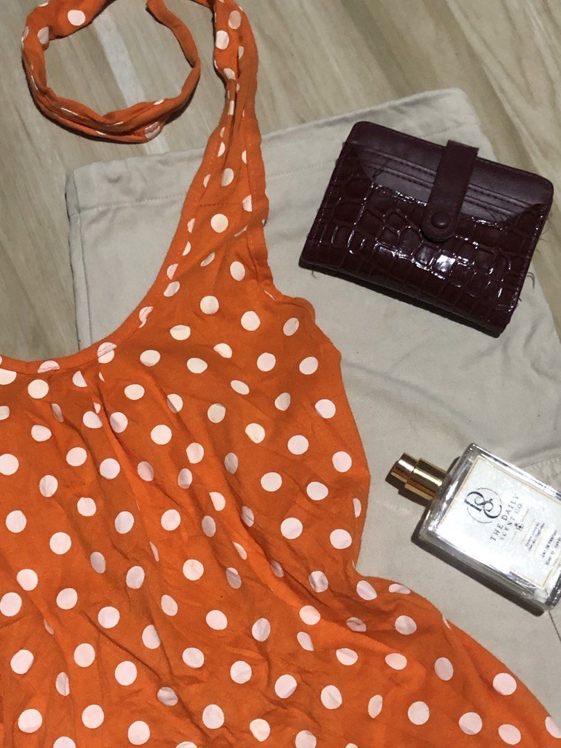Orange Halter Top (Category: Sleeveless) located in Manila. Submitted by sol.thrift (Listing ID 1470609827, Image 3). Description: halter top polka dot ( premium ) ❗️details - size : small - code : 01 - color : orange - fabric : voile - condition : 10/10 📌 note - first grab first serve - code is a must! - read rules before you buy.