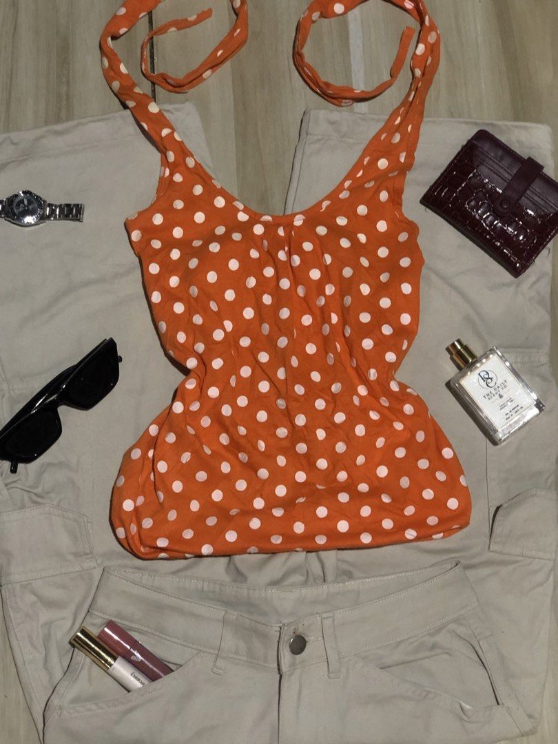 Orange Halter Top (Category: Sleeveless) located in Manila. Submitted by sol.thrift (Listing ID 1470609827, Image 2). Description: halter top polka dot ( premium ) ❗️details - size : small - code : 01 - color : orange - fabric : voile - condition : 10/10 📌 note - first grab first serve - code is a must! - read rules before you buy.