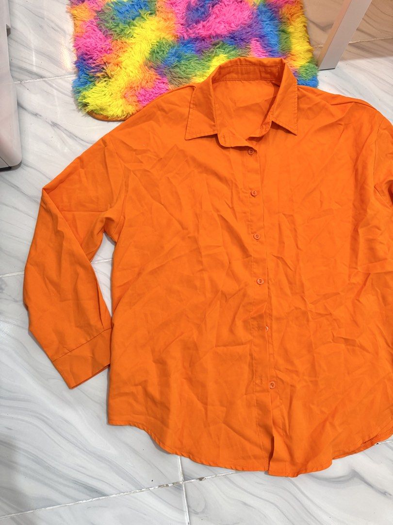 Orange Polo Longsleeves (Category: Longsleeves) located in Bulacan. Submitted by archivesbyjanine (Listing ID 1470681860, Image 2). Description: M-L Oversized for xs-s frame.