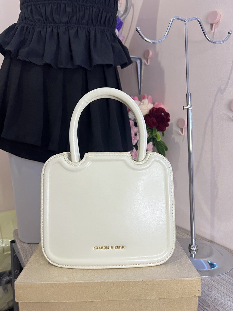 ORIG Charles & Keith handbag (Category: Shoulder Bags) located in Quezon City. Submitted by handpicked_collections_ph (Listing ID 1470654252, Image 3). Description: .