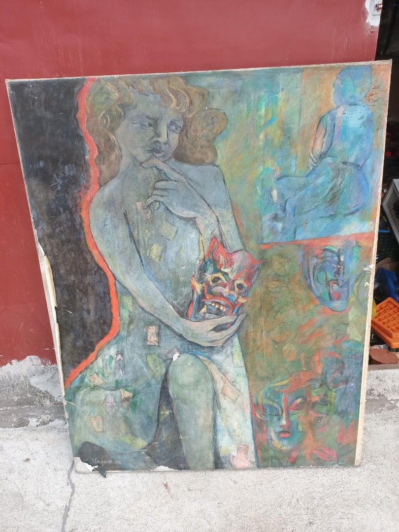 Original artwork featuring a figure holding a mask (Category: Art & Prints) located in Taguig. Submitted by grandfish_55ab5c (Listing ID 1470567468, Image 2). Description: - Type: Original handmade artwork on canvas - Artist: Signed by K. Nagamine - Design: Figure holding a red mask with abstract faces and elements - Color Palette: Muted tones of blue, green, and grey - Texture: Rough edges and visible texture from direct canvas painting - Condit