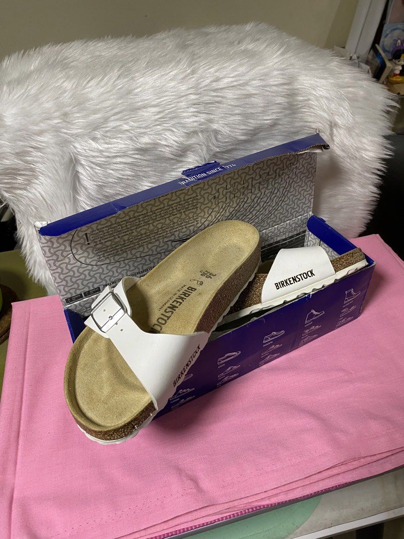 Original Birkenstock (Category: Slippers and slides) located in Caloocan City. Submitted by andracse03 (Listing ID 1470719219, Image 3). Description: BIRKENSTOCK Madrid Birko -White ✔️ Authentic Birkenstock ✔️ White single-strap design with adjustable buckles ✔️ Comfortable contoured footbed ✔️ Lightly used — still in good condition ✔️ Comes with original box Perfect for everyday wear, casual outfits, and minimalist styling. Size: EU 36 Inclusion