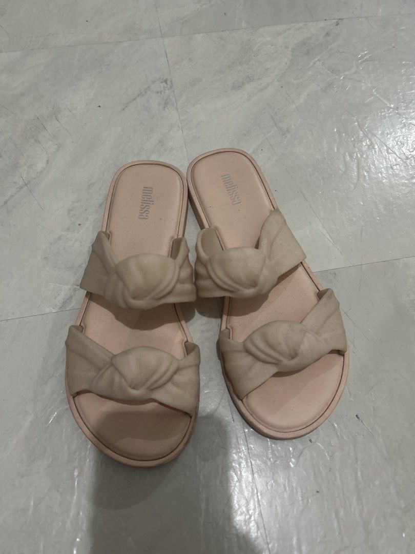 Original Melissa Sandals (Category: Flats & Sandals) located in Binan City. Submitted by apparel30 (Listing ID 1470683666, Image 1). Description: Original Size 6 No issue, signs of usage and needs cleaning Shoe/sandals pouch included.