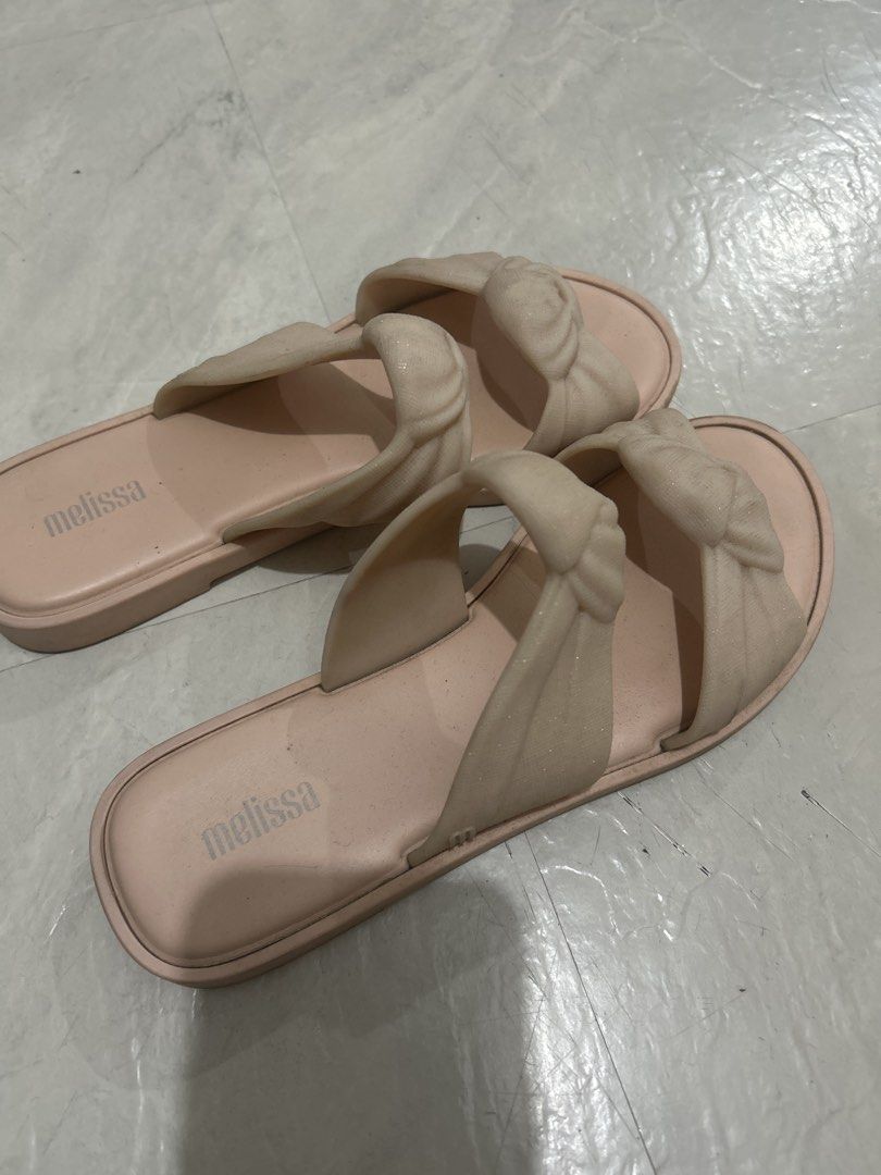 Original Melissa Sandals (Category: Flats & Sandals) located in Binan City. Submitted by apparel30 (Listing ID 1470683666, Image 2). Description: Original Size 6 No issue, signs of usage and needs cleaning Shoe/sandals pouch included.