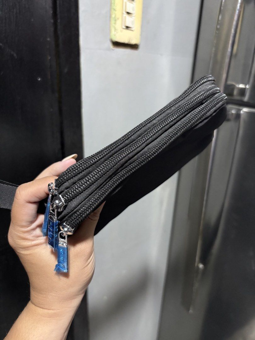 Original Michaela Phone Wallet Pouch Nylon (Category: Purses & Pouches) located in Manila. Submitted by hsanreii (Listing ID 1470738304, Image 3). Description: 295 each +20 for eco bag.