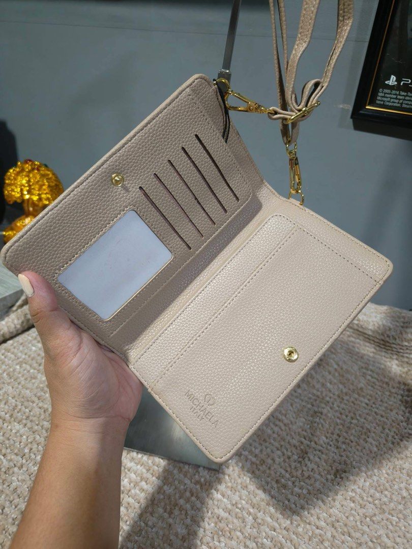 Original Michaela Wallet Phone Sling Bag (Category: Wallets & Card holders) located in Manila. Submitted by hsanreii (Listing ID 1470737466, Image 2). Description: original brandnew with eco bag .