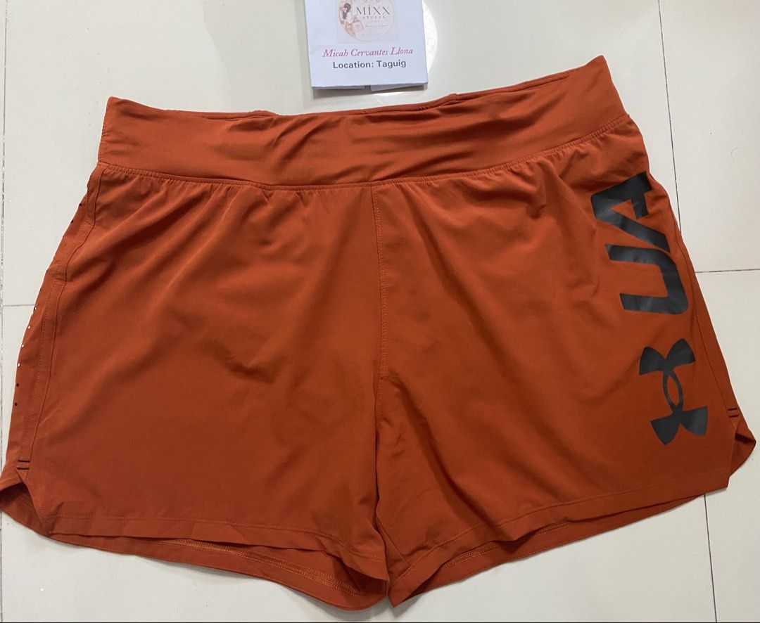 Original Under Armour Speedpocket Orange Athletic Shorts (Category: Shorts) located in Taguig. Submitted by mixxstuffsshopii (Listing ID 1470601708, Image 3). Description: 👉Original Under Armour Mens's Speedpocket with Inner brief size XL 👉Price: 950 👉Size : L- 15"/ Waist- 34"-42" Stretch 👉Very Good Condition 👉Location: Central Signal Taguig #UnderArmourSpeedpocketShort #MixxStuffsShop #AllOriginal.