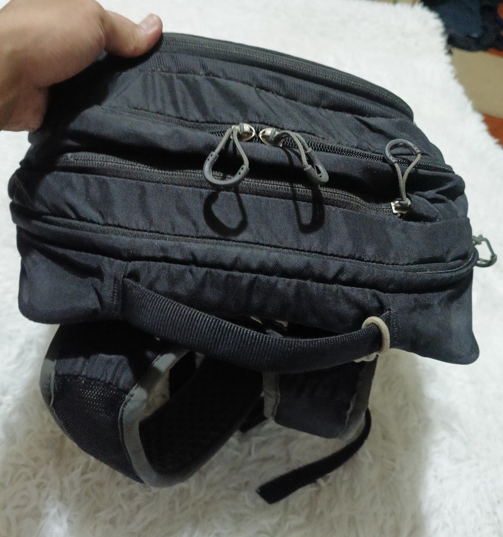 Osprey Radial 26 Backpack Black (Category: Backpacks) located in Quezon City. Submitted by lootsniwoah_12 (Listing ID 1470662402, Image 3). Description: - Brand: Osprey Radial 26 - Color: Sleek black with stylish neon green accents - Storage: Multiple zippered compartments and dedicated organizing pockets - Comfort: Ventilated mesh back panel and padded shoulder straps with sternum strap - Safety: Reflective detailing on the front for visibility 