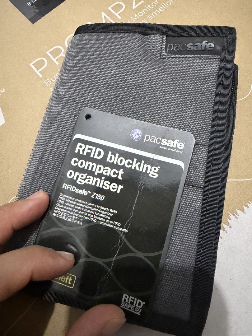 Pacsafe RFIDsafe Z150 RFID Blocking (TRAVEL ABORAD) (Category: Luxury Bags & Wallets) located in Santa Rosa. Submitted by justuniqloph (Listing ID 1470641626, Image 3). Description: - Brand: Pacsafe - Model: RFIDsafe Z150 Compact Organiser - Color: Grey - Condition: Used stil have the with original tag attached - Security: Built-in RFID-blocking technology to protect against electronic theft - Interior Features: Multiple card slots, secure zipper