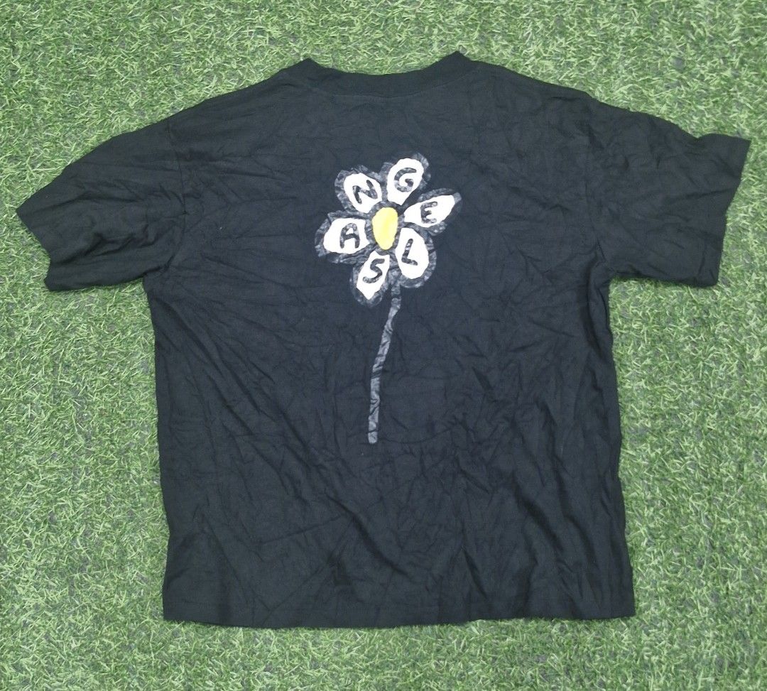 Palm angel flower logo (Category: Shirts) located in Pili. Submitted by the_g_thrift (Listing ID 1470661312, Image 2). Description: size large on tag dimes: 20 x 24 excellent condition.