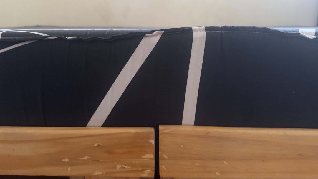 Palochina bed frame with 6inch mattress (Full Double) (Category: Bed Frames & Mattresses) located in Manila. Submitted by youngforest-1b9e (Listing ID 1470694241, Image 3). Description: - Size: Full Double (54” x 75”) - Type: Varnished palochina wood bed frame with natural finish - Storage: 2 smooth, wheel-mounted pull-out drawers underneath (missing one handle) - Included: Black and white geometric patterned mattress (6 inch thknss) - Condition: