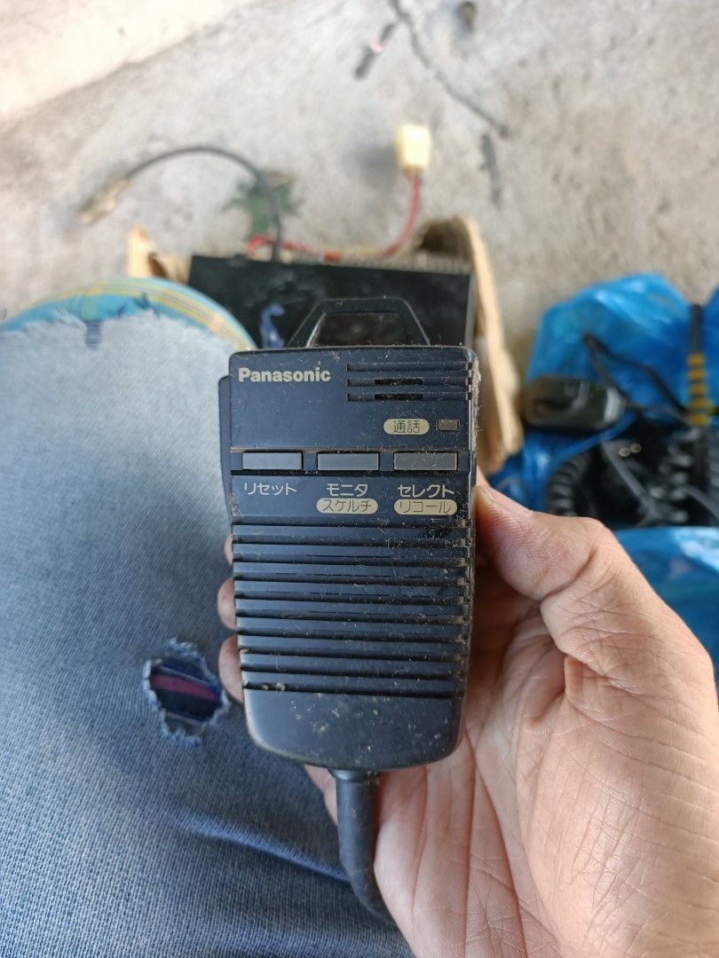 Panasonic Personal Transceiver PQ-13 with Mic (Category: Portable Music Players) located in Taguig. Submitted by grandfish_55ab5c (Listing ID 1470570476, Image 3). Description: - Brand/Model: Panasonic Personal Transceiver PQ-13 unit - Includes: Handheld microphone with push-to-talk button, power cable with white connector plug, and attached coiled cord - Features: Multiple numbered channel buttons, volume knob, small LCD screen, antenna port, an