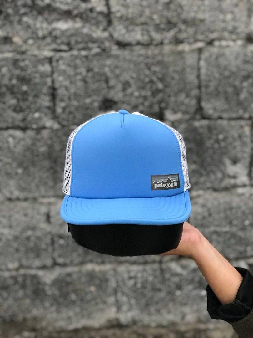 Patagonia Blue Duck Bill (Category: Caps & Hats) located in Manila. Submitted by jowiegarci63146 (Listing ID 1470562070, Image 1). Description: - Authentic Patagonia trucker hat in bright blue and white - Classic foam front panel with iconic woven mountain logo patch - Clean white mesh backing for breathability - Adjustable snapback closure for a customizable fit.