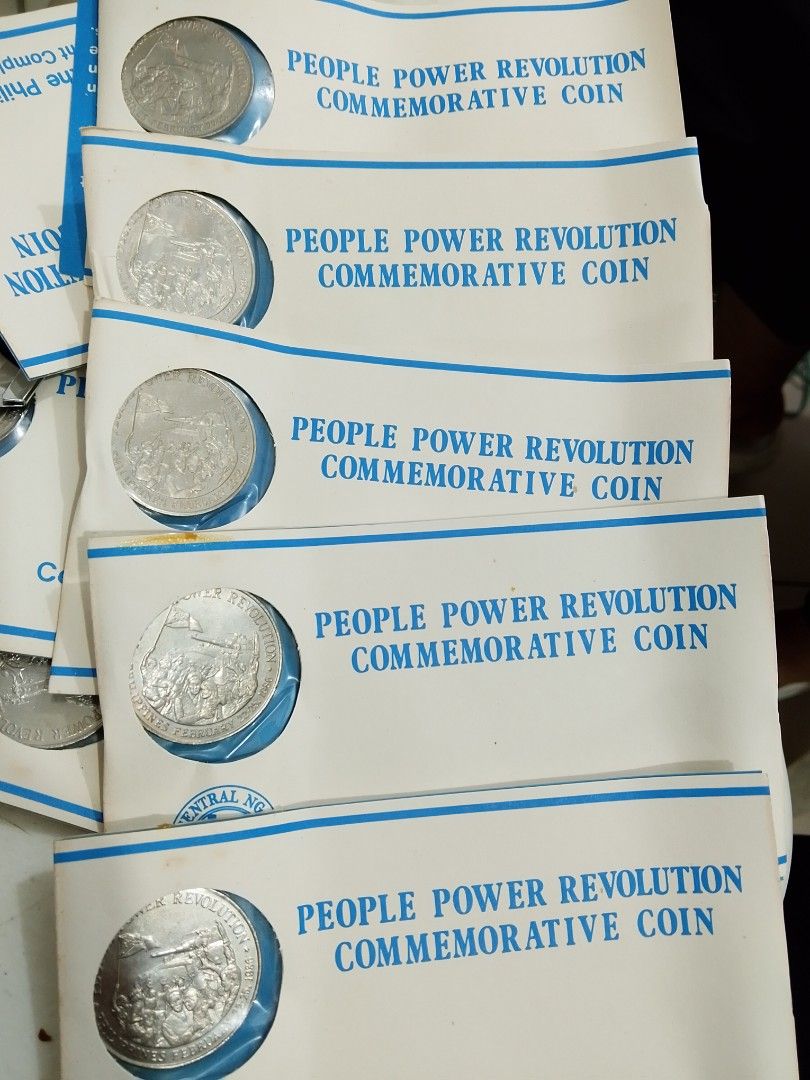 People Power Revolution commemorative coins (Category: Announcements) located in Quezon City. Submitted by coinsandbanknotes (Listing ID 1470656574, Image 1). Description: 100 each UNC.