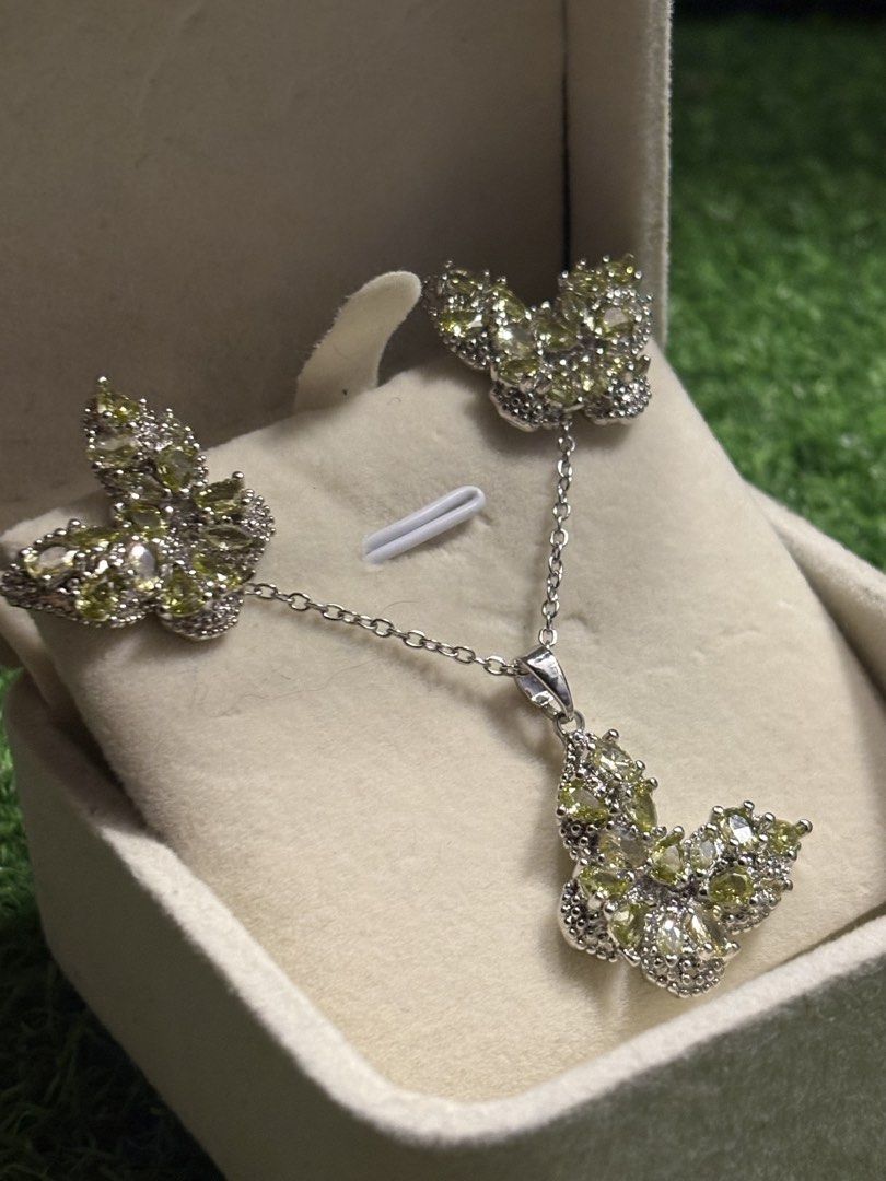 💚peridot set earrings & necklace gemstone (Category: Necklaces) located in Davao. Submitted by ememlou17 (Listing ID 1470576026, Image 2). Description: 💚🦋peridot butterfly set earrings, necklace gemstone. Necklace size 16-18inches Markings au750 Uv reactive Rodium/ Platinum over copper based metal Tarnish resistant with extra care Message me directly📩.