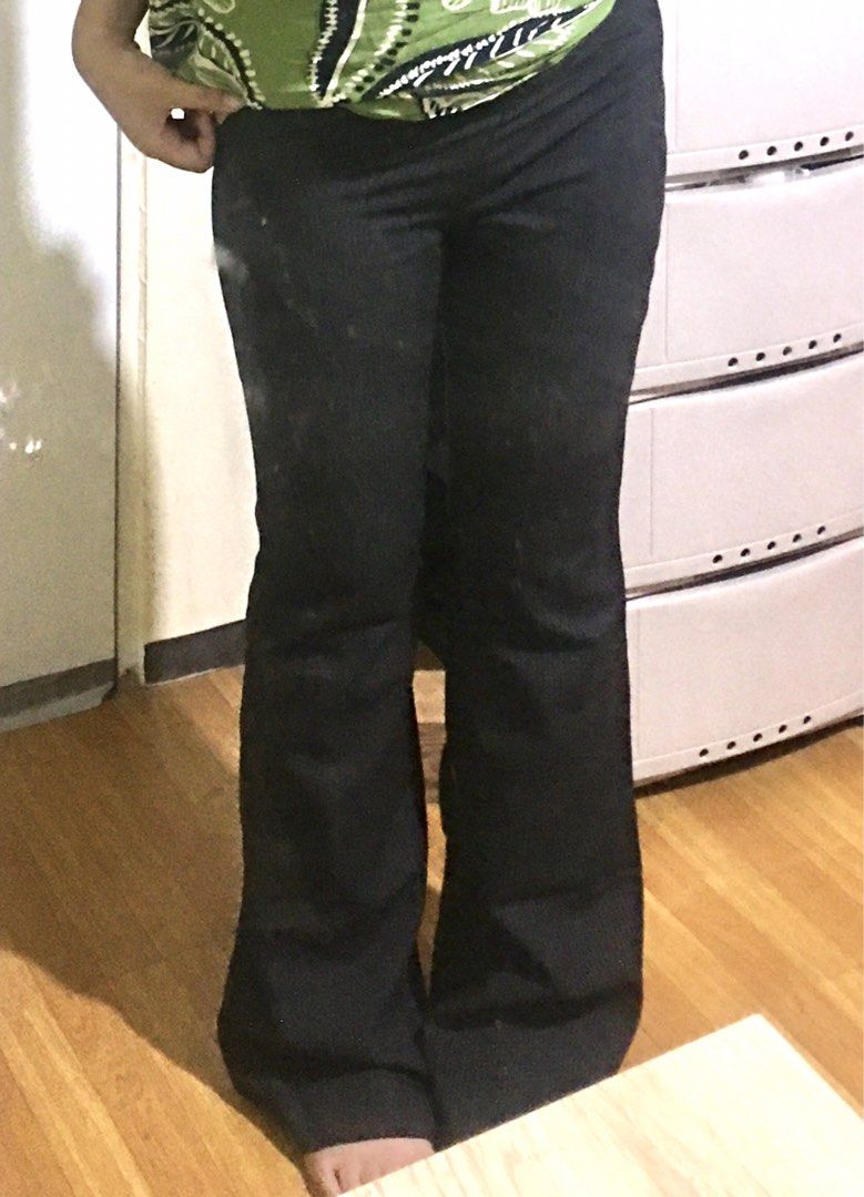 Petite Pinstripe Flared Trouser Pants (Category: Jeans) located in Cabuyao City. Submitted by 4everblooms (Listing ID 1470087616, Image 2). Description: - Size: S (24 in wl, 9 in rise, 40 in length) - Color: Black with subtle vertical white pinstripes - Closure: Side zip - Condition: Clean, excellent quality mop: gcash/maribank mod: jnt/ meet-up in nearby areas 🖇 dm me for more details.