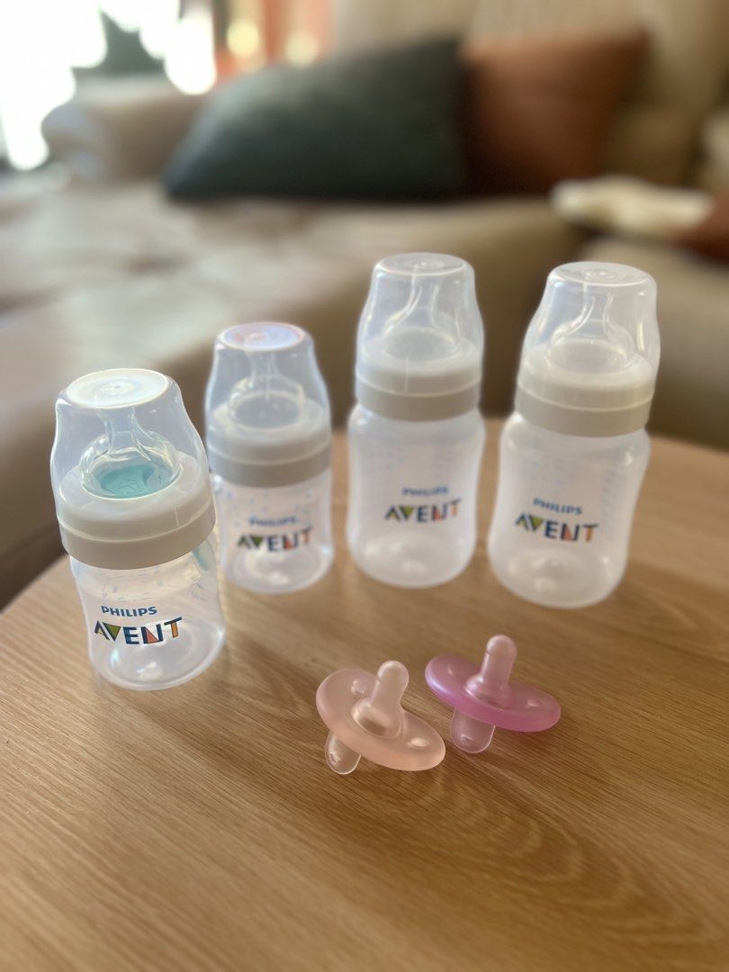 Philips Avent Baby Bottles and Soothie Pacifiers Bundle (Category: Breastfeeding & Bottle Feeding) located in Quezon City. Submitted by sisyphus.happy (Listing ID 1470604117, Image 1). Description: - Bundle of Philips Avent feeding bottles in varying sizes - Comes complete with caps and nipples - Includes 2 bonus pink silicone pacifiers - Clean condition, freshly cleared from nursery storage - Perfect essentials for your little one.