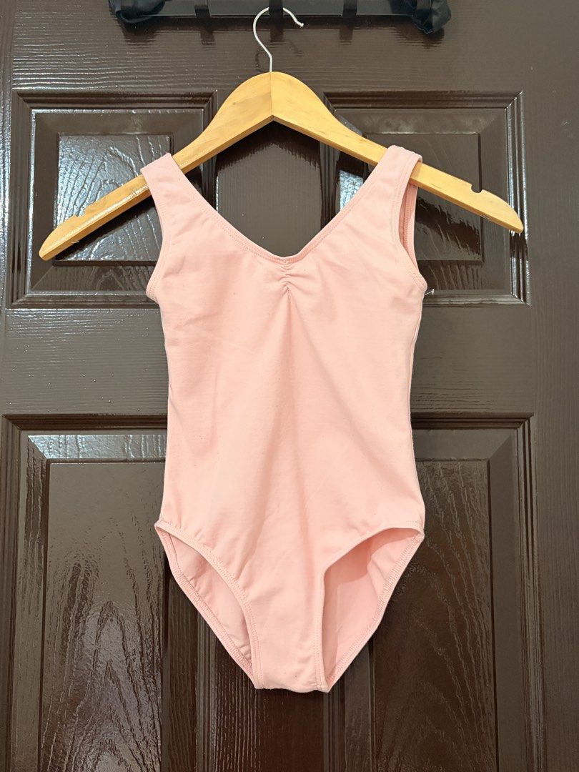 Pink ballet dance leotard with gathered front (Category: Babies & Kids Fashion) located in Marikina City. Submitted by _bananahanaa (Listing ID 1470674314, Image 1). Description: - Color: Soft pink - Design: V-neckline with gathered center front and scoop back - Style: Simple sleeveless leotard - Ideal for: Ballet classes, dance practice, and recitals - Condition: Clean.