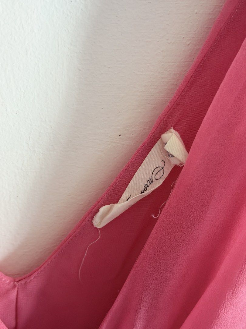 Pink Forever 21 Sleeveless Blouse with Bow Tie (Category: Sleeveless) located in Imus. Submitted by dayseasons (Listing ID 1470564428, Image 3). Description: - light & flowy fabric - just a small hole on the side (but unnoticeable) .