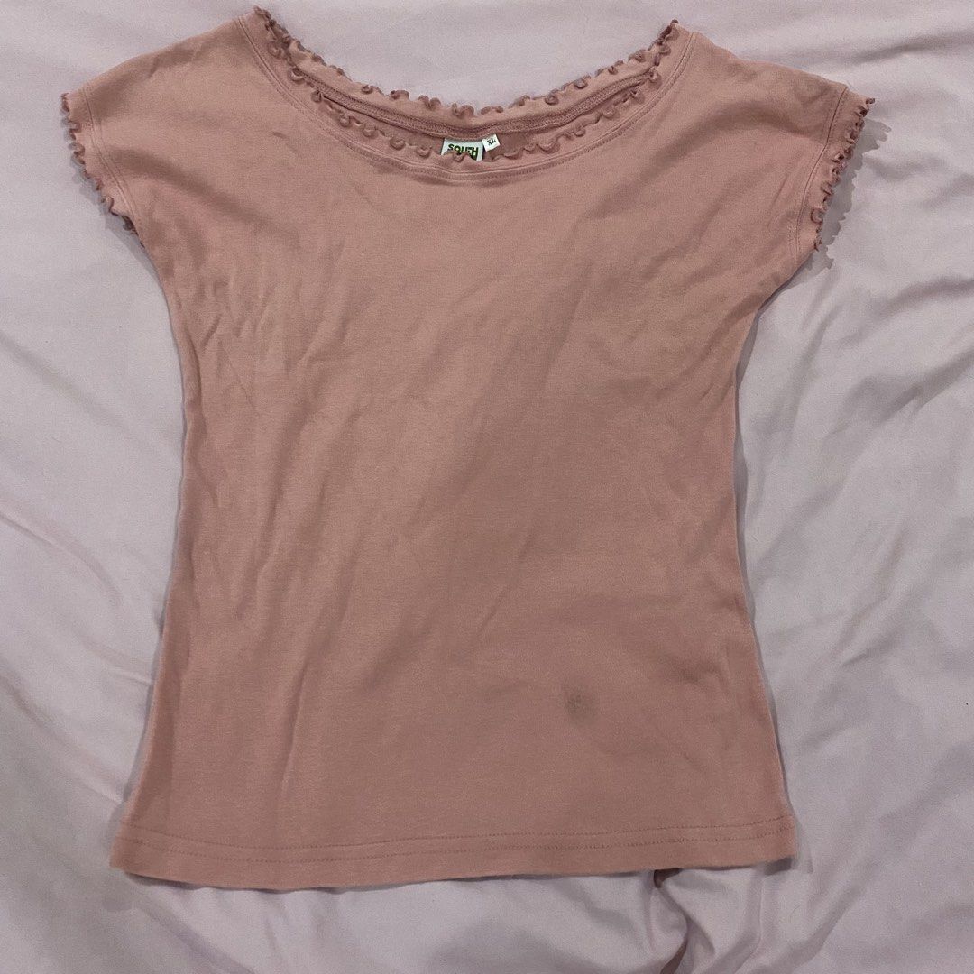 Pink Ruffle Trim Short Sleeve Top (Category: Shirts) located in Pasay City. Submitted by thrift_from_me (Listing ID 1470558023, Image 1). Description: - Color: Pink - Size: XL - Material: Soft and comfortable cotton - Features: Delicate ruffle trim on scoop neckline and cuffs - Condition: Good, with a small faint stain near the bottom right hem - Styling: Great for pairing with jeans or skirts.