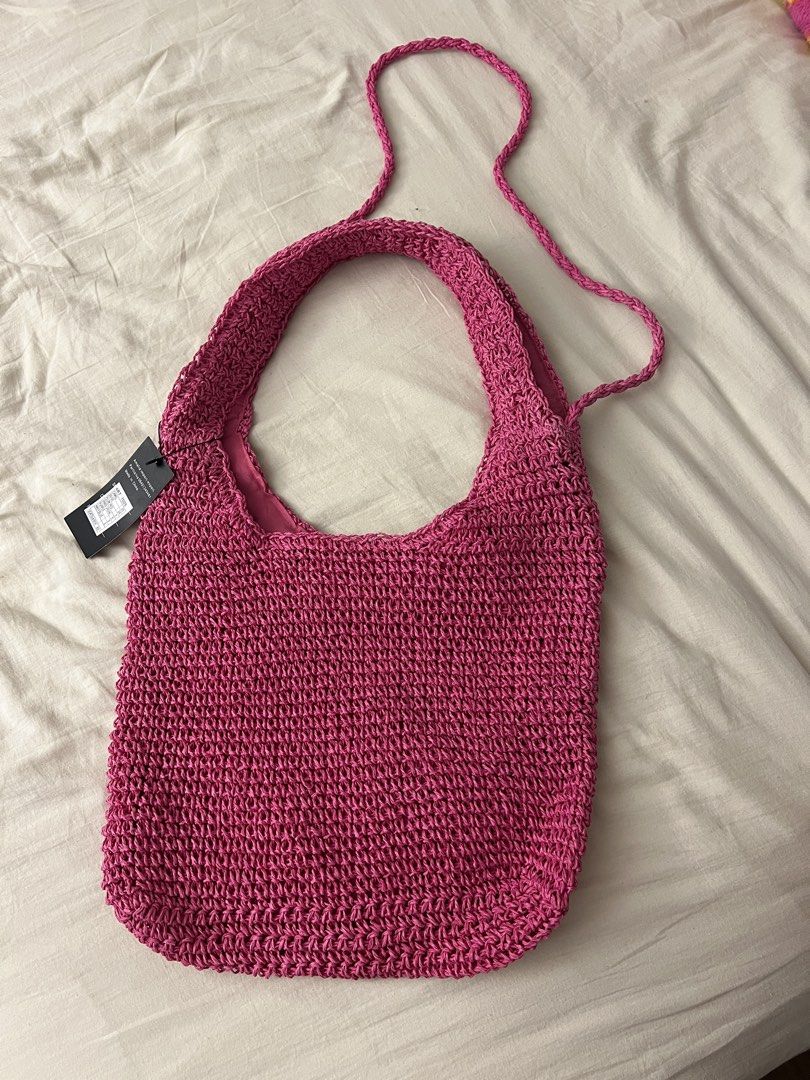 Pink Woven Straw Shoulder Bag with Zipper (Category: Shoulder Bags) located in Paranaque City. Submitted by closetcore (Listing ID 1470626330, Image 2). Description: Brand new! Bought in Belgium for 3500. Fits a 14in laptop.