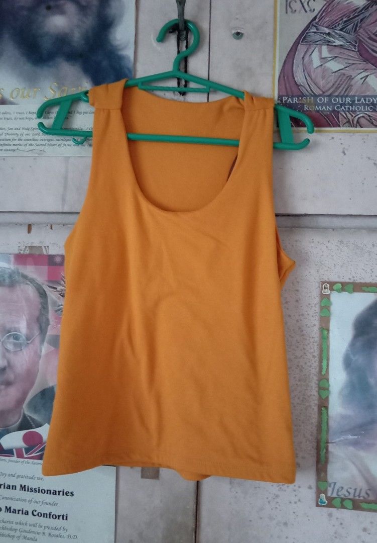 Plain Racerback Tank Top Bundle Purple and Orange (Category: Sleeveless) located in Quezon City. Submitted by chacha30.s (Listing ID 1470560169, Image 3). Description: - Set of 2: Light purple and mustard orange racerback tank tops - Design: Scoop neckline, sleeveless, and cropped length - Material: Soft and stretchy cotton blend for all-day comfort - Versatility: Essential daily casual basics, easy to style with shorts or jeans . Text me at 0927