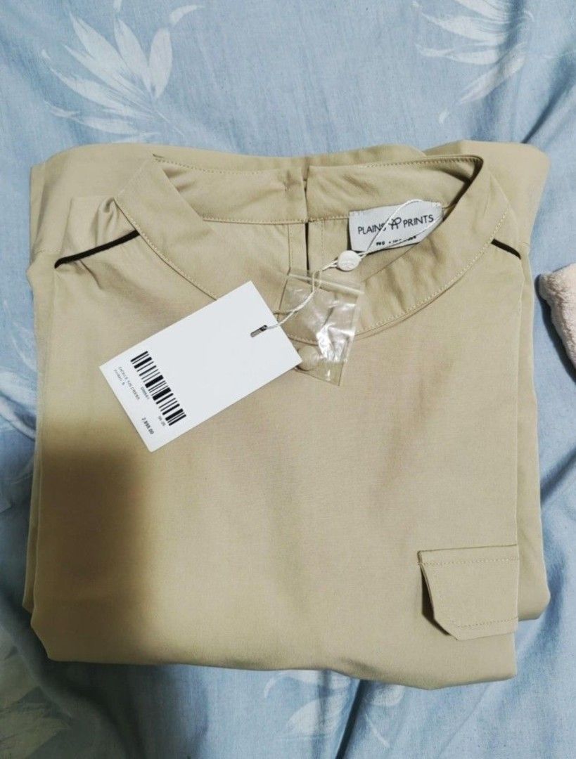 Plains and prints dress (Category: Dresses) located in Cainta. Submitted by buena_shoppe (Listing ID 1470681766, Image 2). Description: brand new with tag small in size runs medium beige color plus shipping fee last price posted.