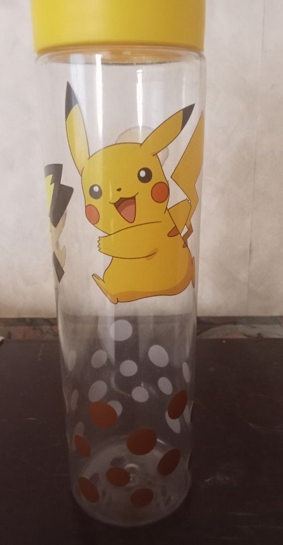 Pokemon Pikachu Merchandise Bundle (Category: Character Goods) located in Cavite. Submitted by emilgarcia09 (Listing ID 1470729652, Image 3). Description: - Official Pokémon bundle featuring must-have Pikachu items - Pikachu Character Pillow: Super soft and cozy, shaped like everyone's favorite electric mouse - Clear Water Bottle: Tall design featuring cute Pikachu and boba tea graphics - Pokémon Series XY Metal Straw: Comes with a stylish emblem