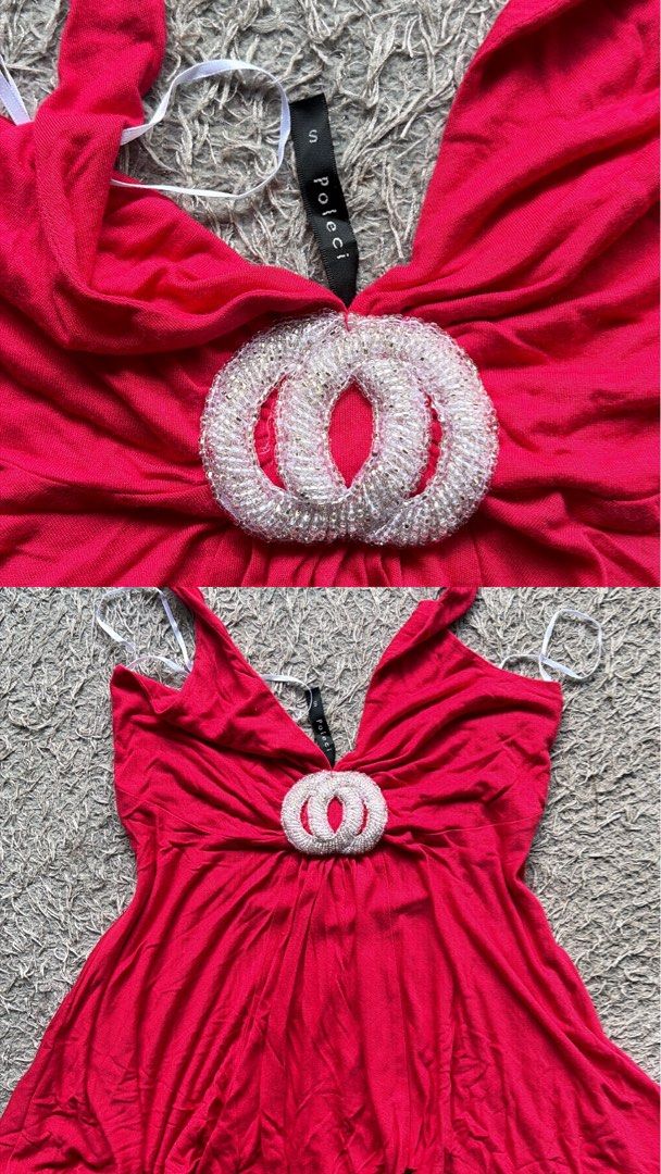 Poleci Red Halter Top with Beaded Ring Detail Size S (Category: Sleeveless) located in Carmona. Submitted by camille.02 (Listing ID 1470633565, Image 2). Description: - Brand: Poleci - Size: Small (tag) - Color: Bright red - Neckline: Deep V-neck with chunky rhinestone and beaded circular ring accent - Straps: Halter style with tie-behind closure - Fabric: Soft and stretchy - Fit: Flowy, gathered hem.