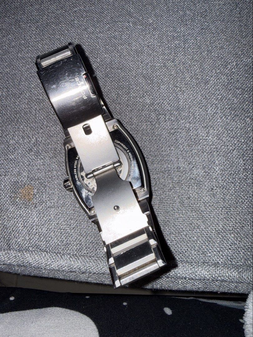 Police Automatic Skeleton Stainless Steel Wristwatch (Category: Men's Watches) located in Manila. Submitted by rare.desteen (Listing ID 1470563699, Image 3). Description: - Brand: Police Automatic Skeleton Wristwatch - Case: Tonneau-shaped silver-tone stainless steel - Dial: Black inner dial with visible intricate mechanical movement - Strap: Matching stainless steel link bracelet with folding clasp - Movement: Automatic self-winding (visible fro
