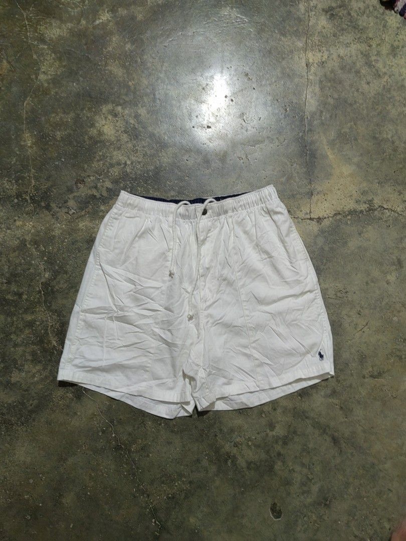 Polo Ralph Lauren White Drawstring Shorts (Category: Shorts) located in Matnog. Submitted by erasmoarnold.b9c007 (Listing ID 1470634744, Image 1). Description: - Brand: Polo Ralph Lauren - Color: Classic White - Material: Lightweight, breathable cotton (ideal for warm weather) - Fit/Adjustability: Elastic waistband with adjustable drawstring - Branding: Small embroidered pony logo near the left hem - Details: Back pocket with flap closure and POL