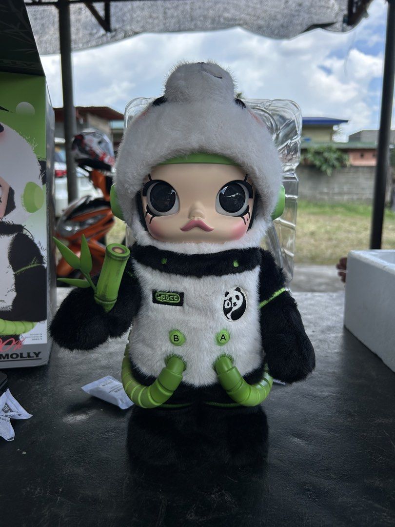 Pop Mart Mega Space Molly Panda 400% (Category: Designer & Blind Box Toys) located in Kidapawan. Submitted by kukaaai (Listing ID 1470599867, Image 2). Description: - Authentic Pop Mart Mega Space Molly Panda 400% collectible figure - Includes original box and protective plastic packaging insert - Versatile display: removable panda hood can be worn down or flipped up - Features detailed space suit design, green accents, and a cute bamboo accessor