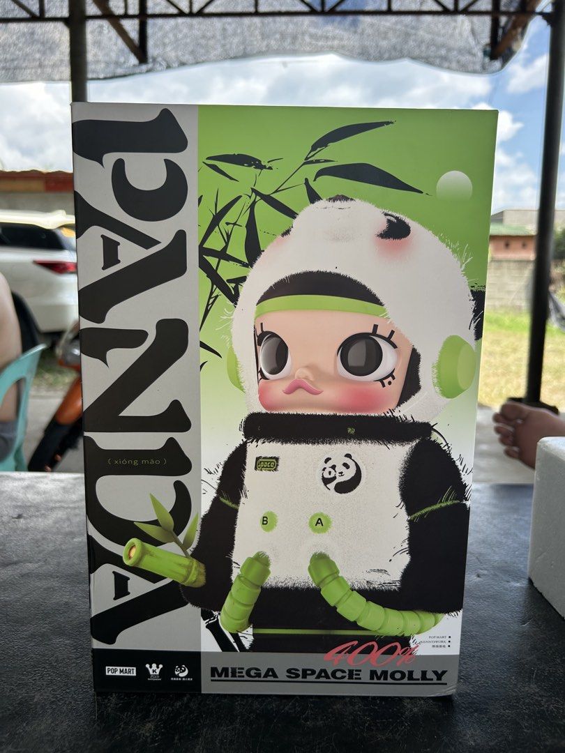 Pop Mart Mega Space Molly Panda 400% (Category: Designer & Blind Box Toys) located in Kidapawan. Submitted by kukaaai (Listing ID 1470599867, Image 1). Description: - Authentic Pop Mart Mega Space Molly Panda 400% collectible figure - Includes original box and protective plastic packaging insert - Versatile display: removable panda hood can be worn down or flipped up - Features detailed space suit design, green accents, and a cute bamboo accessor